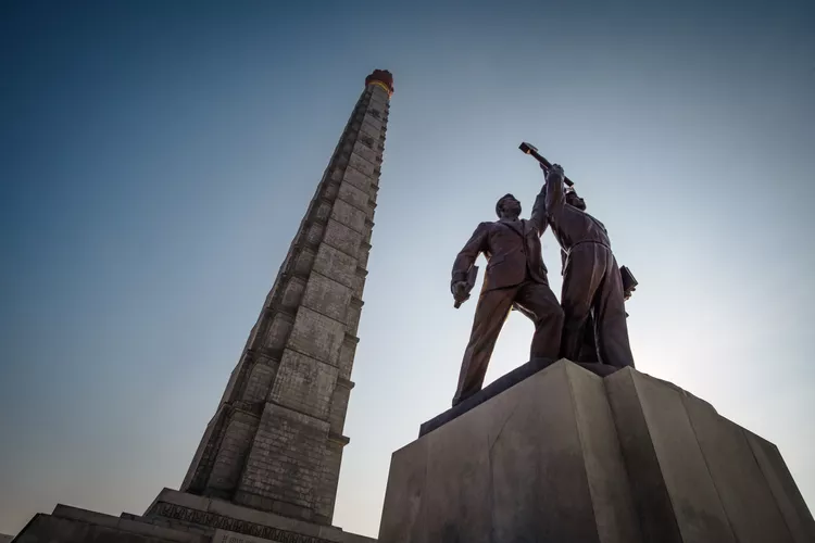 juche-tower-and-workers--party-monument-in-pyongyang--north-korea-command economy_communism_87656576
